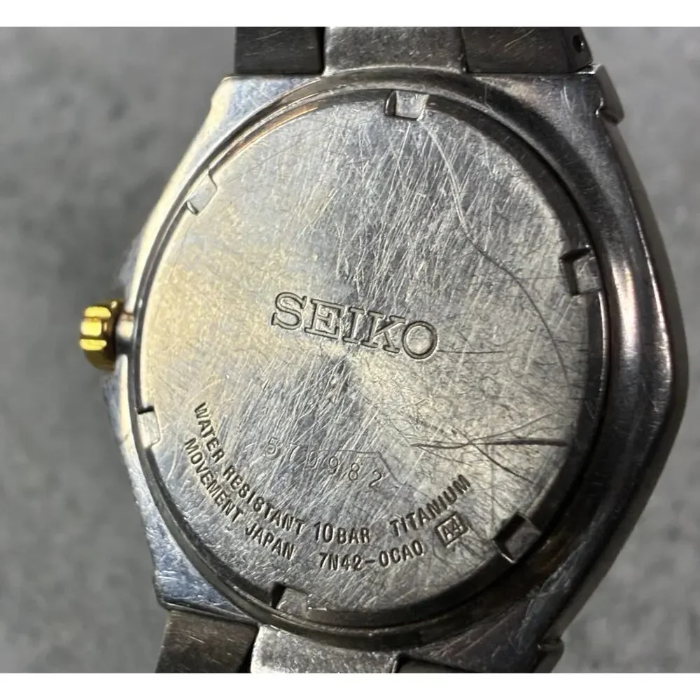 Seiko Titanium Men's Watch 7N42‑0CA0 100M Black Sunburst Dial Date Japan Working